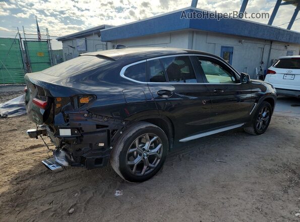 5UX33DT01P9T04692 2023 BMW X4 Black Trasero derecho