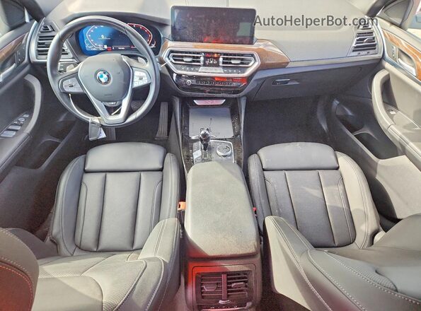 5UX33DT01P9T04692 2023 BMW X4 Black Vista del salpicadero