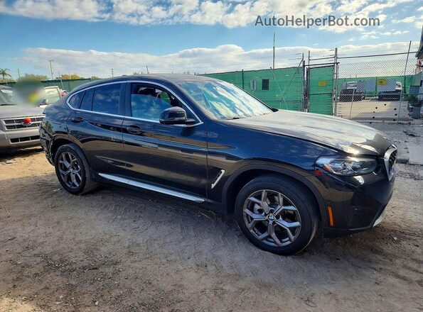 5UX33DT01P9T04692 2023 BMW X4 Black Delantero derecho