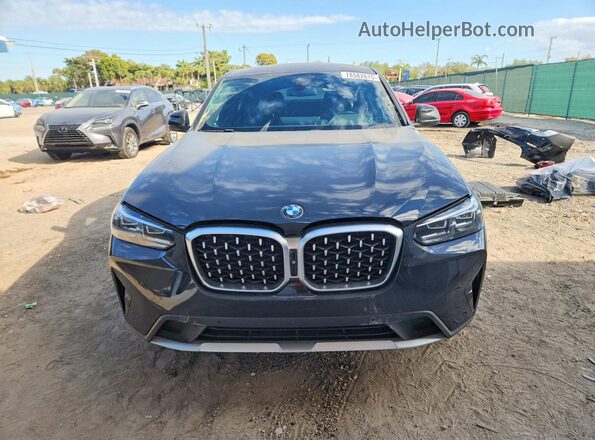 5UX33DT01P9T04692 2023 BMW X4 Black Vista frontal