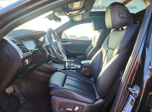 5UX33DT02P9S75252 2023 BMW X4 Charcoal Front interior view
