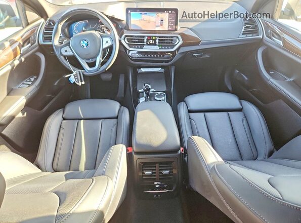 5UX33DT02P9S75252 2023 BMW X4 Charcoal Dashboard view