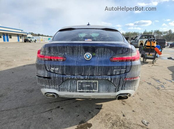 5UX33DT05P9R00825 2023 BMW X4 Blue Vista trasera
