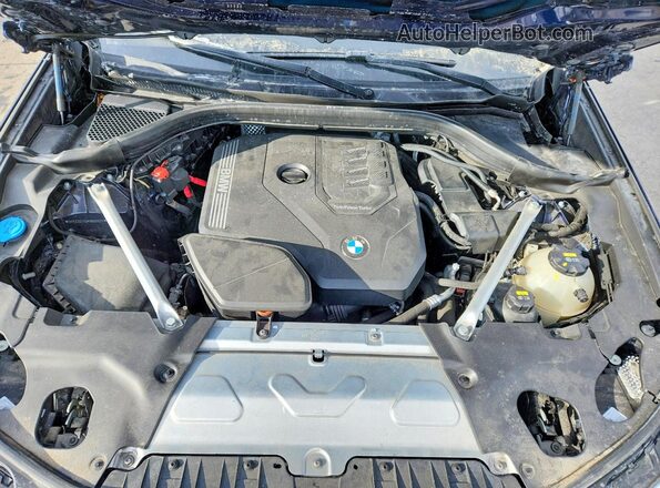 5UX33DT05P9R00825 2023 BMW X4 Blue Vista interior trasera