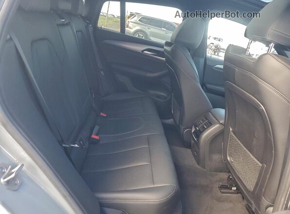 5UX33DT07P9T01831 2023 BMW X4 Gray Vista de los asientos traseros