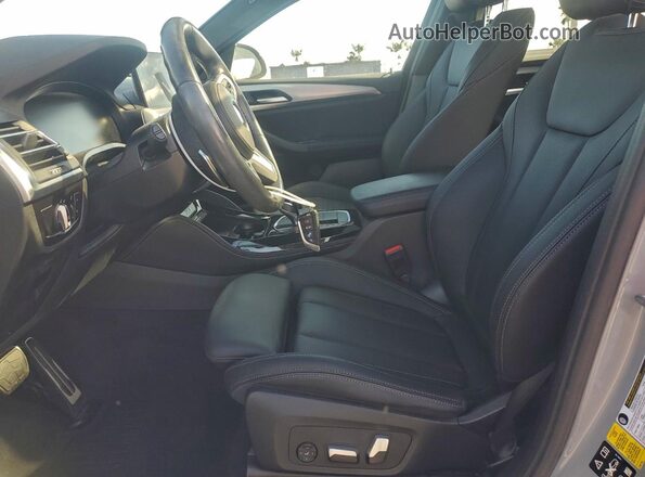5UX33DT07P9T01831 2023 BMW X4 Gray Vista interior delantera