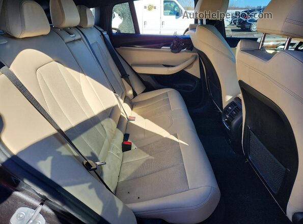 5UX33DT07R9V93371 2024 BMW X4 Черный Вид задней части салона