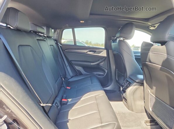5UX33DT08R9U91447 2024 BMW X4 Черный Вид задней части салона