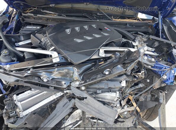 5UX33EM05R9V05616 2024 BMW X7 Blue Вид ззаду