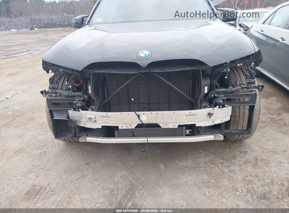 5UX33EM09R9T70625 2024 BMW X7 Black Front view
