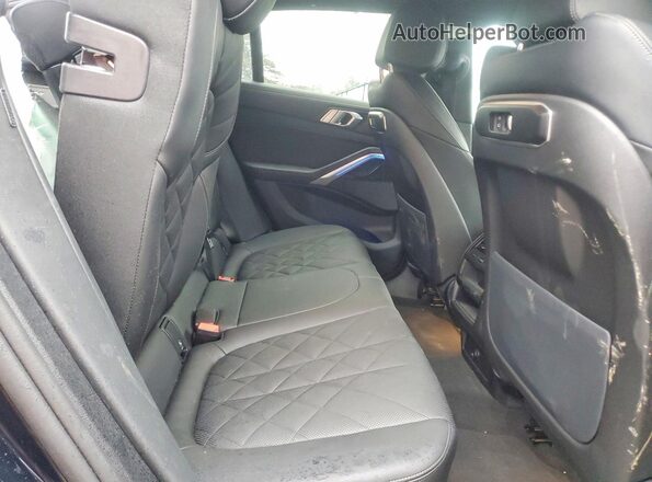 5UX33EX03S9Z08155 2025 BMW X6 Blue Rear interior view
