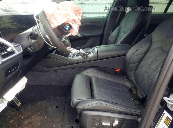 5UX33EX03S9Z08155 2025 BMW X6 Blue Front interior view