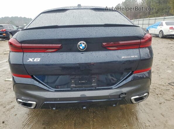 5UX33EX03S9Z08155 2025 BMW X6 Blue Rear view
