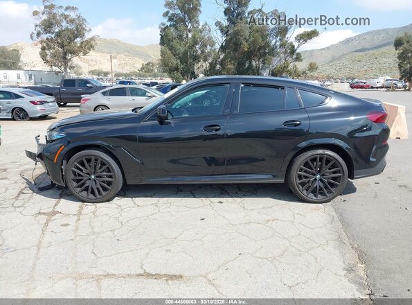 5UX33EX03S9Z90744 2025 BMW X6 Черный Вид задней части салона