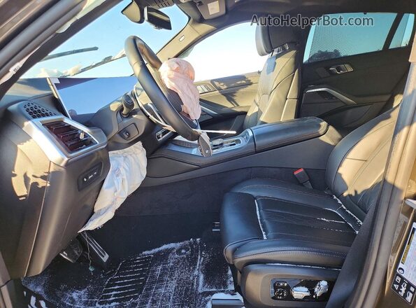 5UX33EX06T9091023 2026 BMW X6 Серый Вид салона спереди