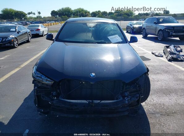 5UX33EX07R9T66908 2024 BMW X6 Синий Вид задней части салона