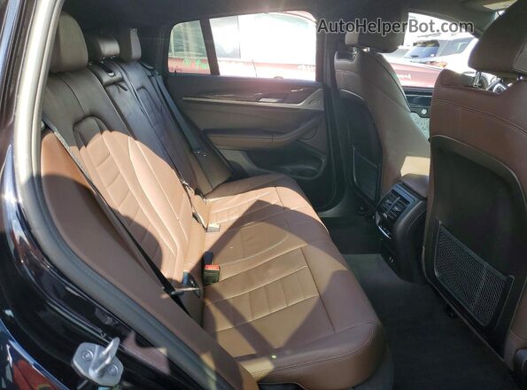5UX43DT04P9N89876 2023 BMW X4 Blue Вид задньої частини салону