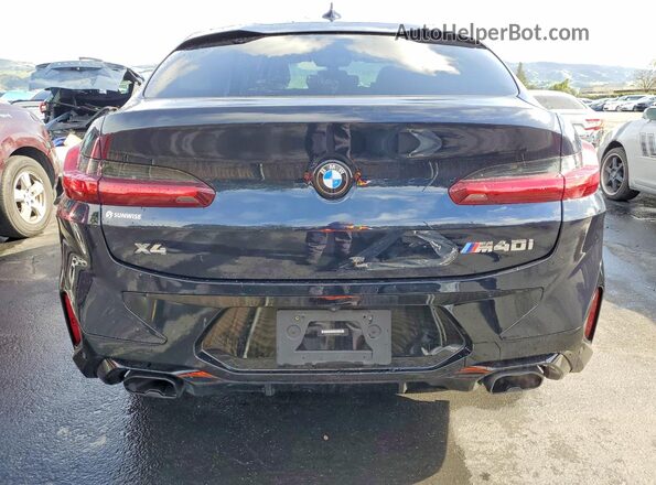 5UX43DT04P9N89876 2023 BMW X4 Blue Вид ззаду