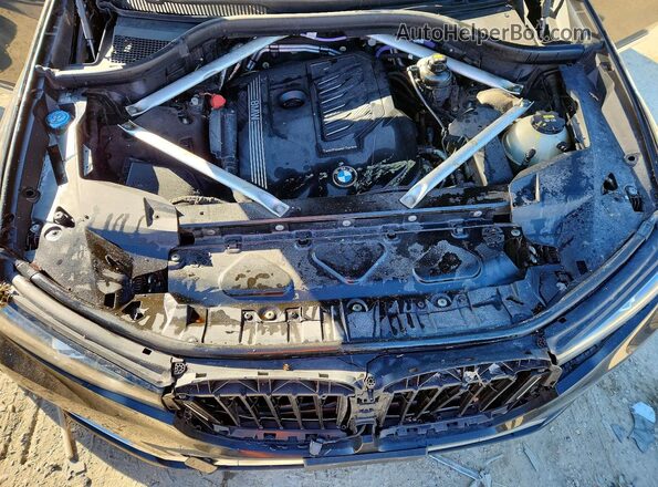 5UXCW2C00M9E88095 2021 BMW X7 Black Widok wnętrza z tyłu