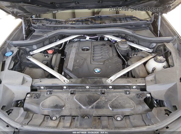5UXCW2C02M9G63818 2021 BMW X7 Black Հետևի տեսք