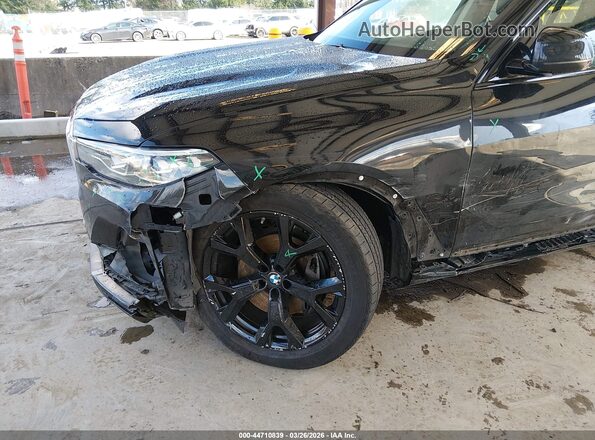 5UXCW2C02M9G63818 2021 BMW X7 Black Դիմացի տեսք