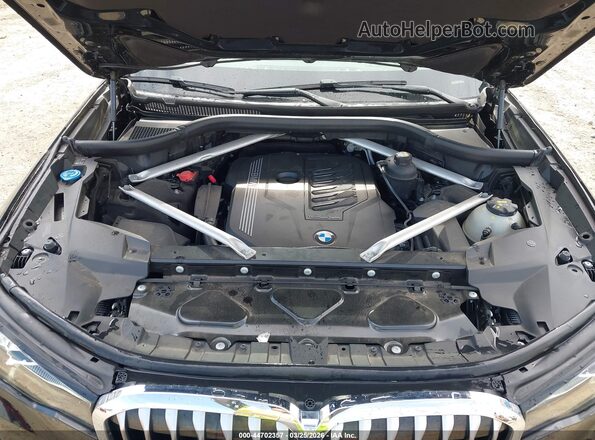 5UXCW2C0XL9B27696 2020 BMW X7 Black Rear view