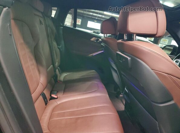 5UXCY6C06L9C37565 2020 BMW X6 Blue Вид задньої частини салону