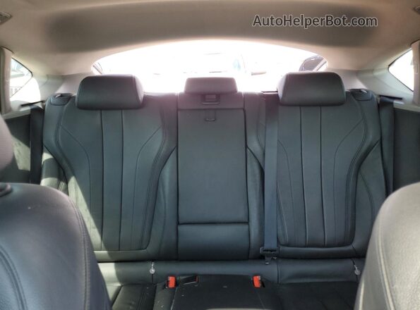 5UXKU2C50G0N78897 2016 BMW X6 Black Vista de los asientos traseros