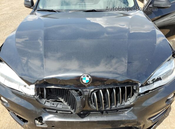 5UXKU2C50G0N78897 2016 BMW X6 Black Vista del compartimento del motor