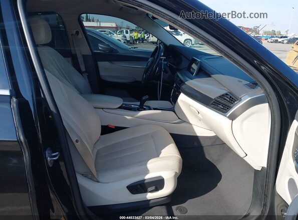 5UXKU2C53G0N81261 2016 BMW X6 Black Widok wnętrza z przodu