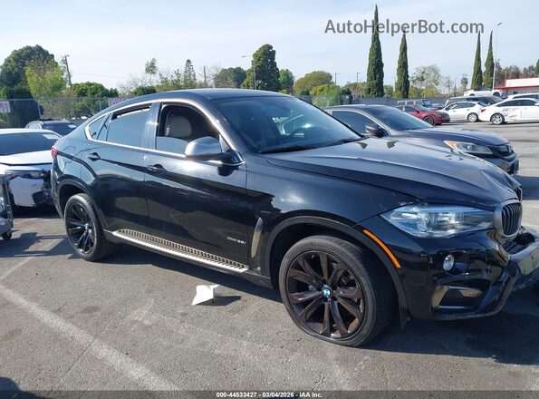 5UXKU2C53G0N81261 2016 BMW X6 Black Widok wnętrza z tyłu