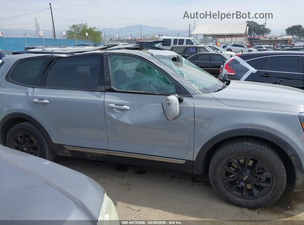 5XYP5DGC2PG403618 2023 KIA TELLURIDE Silver Սալոնի հետևի տեսք