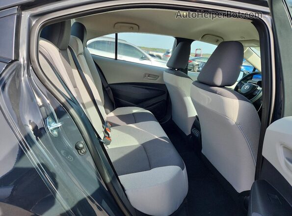 5YFB4MDE4TP364555 2026 TOYOTA LL Charcoal Rear seats view