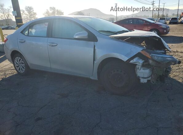 5YFBURHE4KP857674 2019 TOYOTA LL Silver Delantero derecho