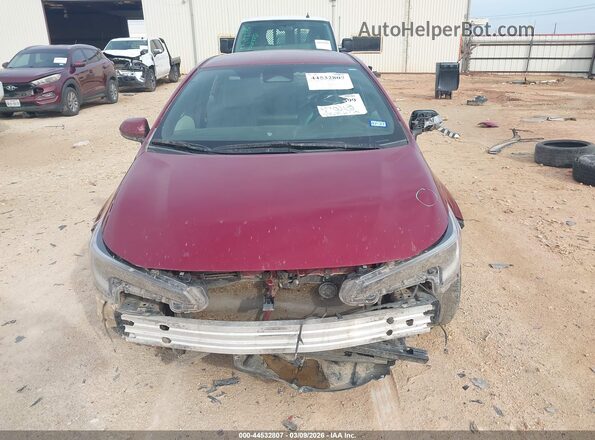 5YFS4MCE6SP242957 2025 TOYOTA LL Maroon Rear interior view
