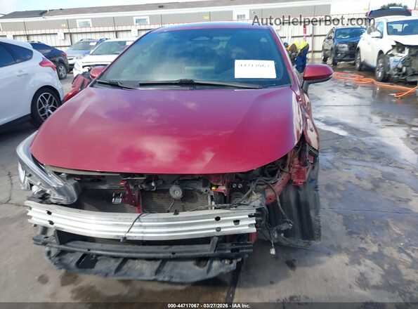 5YFS4MCE7RP184402 2024 TOYOTA LL Maroon Vista interior trasera
