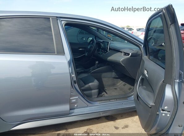 5YFT4MCE0MP089239 2021 TOYOTA LL Light Blue წინა სალონის ხედი