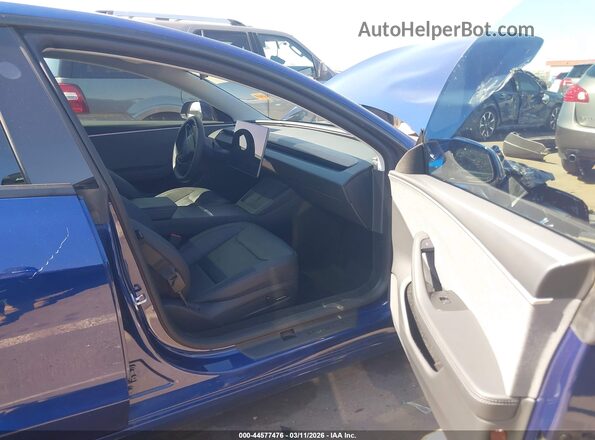 5YJ3E1EA1SF041599 2025 TESLA MODEL 3 Blue Widok wnętrza z przodu