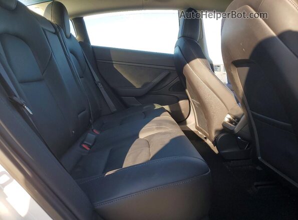 5YJ3E1EB3JF178860 2018 TESLA MODEL White Vista de los asientos traseros