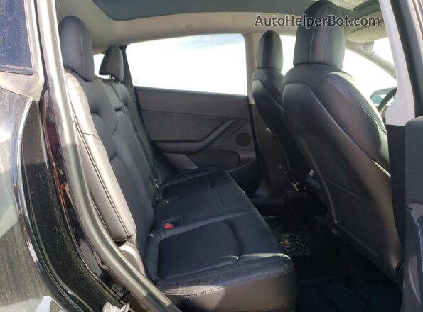 5YJYGDEE0MF077176 2021 TESLA MODEL Black Vista de los asientos traseros