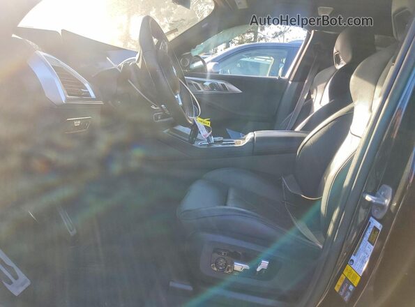5YM23CS09P9S20894 2023 BMW XM Black Вид салону спереду