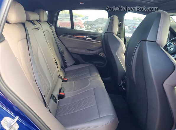5YM23EC03P9R59740 2023 BMW X4 Blue უკანა სავარძლების ხედი