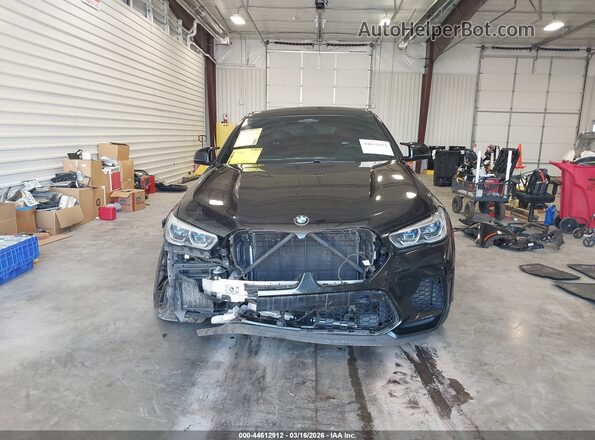 5YMCY0C02L9C56135 2020 BMW X6 M Black Rear interior view