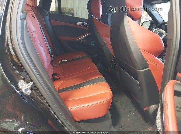 5YMCY0C02L9C56135 2020 BMW X6 M Black VIN sticker view