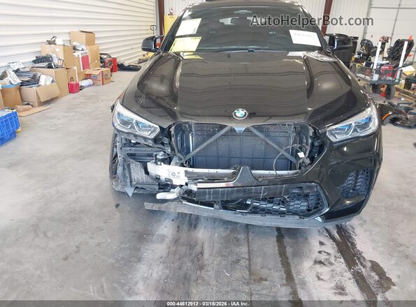 5YMCY0C02L9C56135 2020 BMW X6 M Black Front view