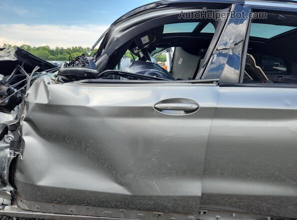 5YMTS0C02M9F31411 2021 BMW X3 Silver Front interior view