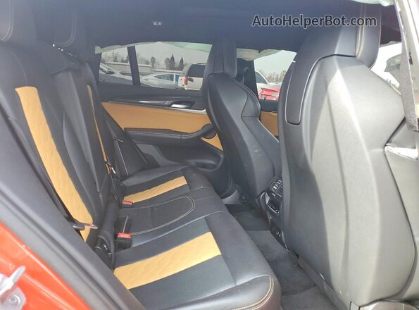 5YMUJ0C04M9F84490 2021 BMW X4 Orange Հետևի նստատեղերի տեսք