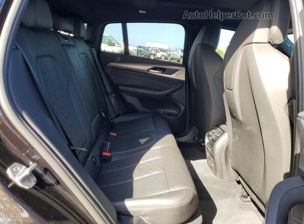 5YMUJ0C0XLLU67219 2020 BMW X4 Черный Вид задней части салона