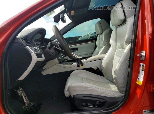 WBSFV9C57GD595500 2016 BMW M5 Orange Widok deski rozdzielczej