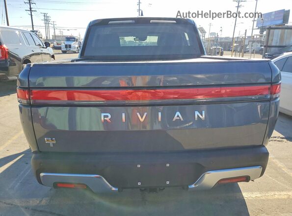 7FCTGAAA4PN001004 2023 RIVIAN R1T Gray Vista interior delantera